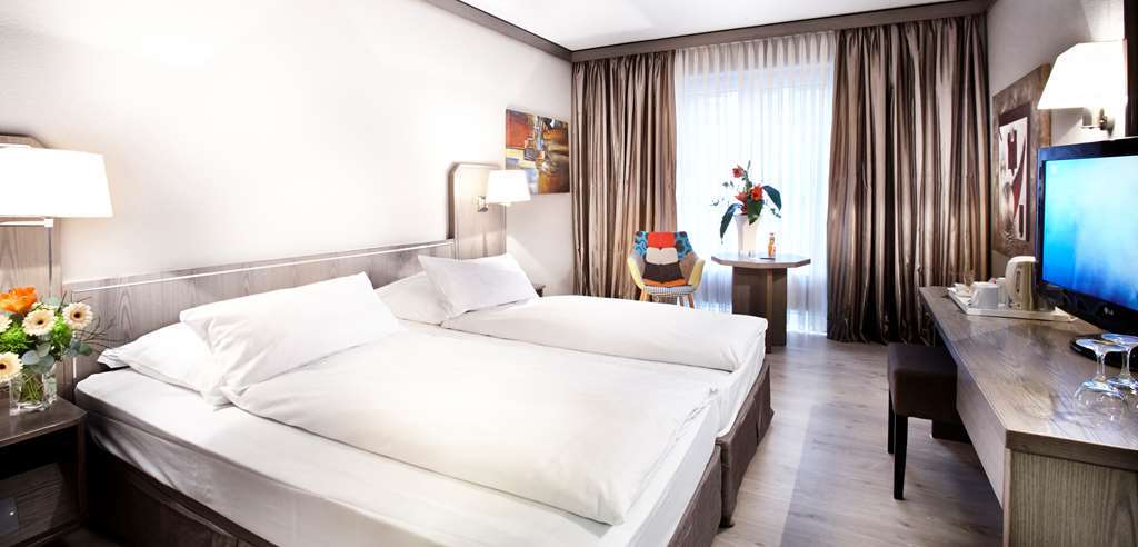 Hotel Duesseldorf City By Tulip Inn Oda fotoğraf